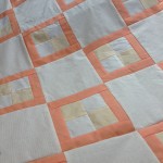 Peach and gold quilt